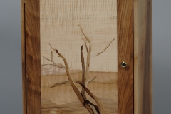 Walnut wall cabinet with marquetry door panel